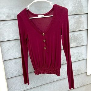 Beautiful purple long sleeve shirt with three buttons